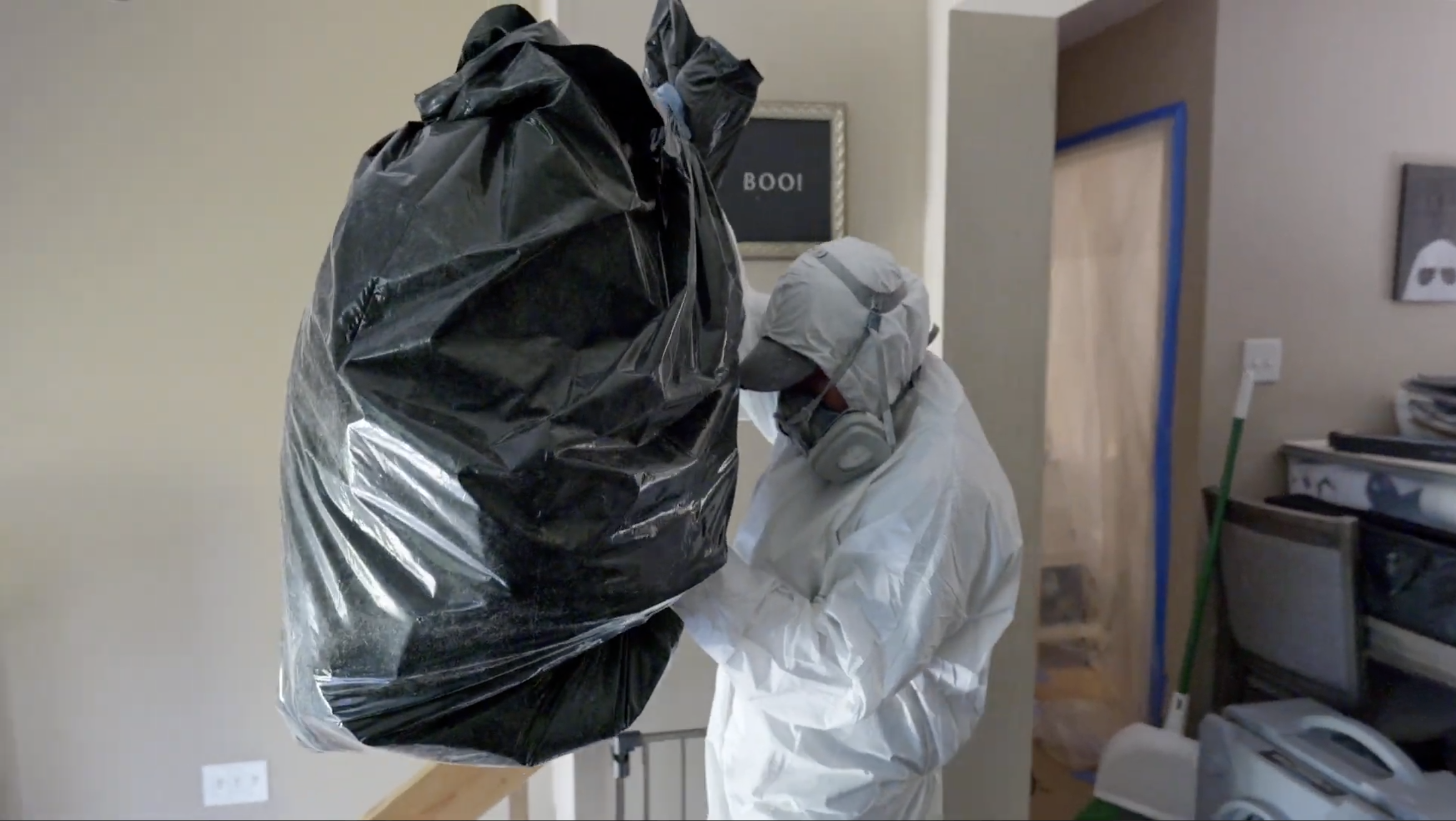 Mold Technician Removing Mold in Trash Bags - Mold Men NJ Mold Removal Expert in Montague, NJ Removing Mold in Trash Bags